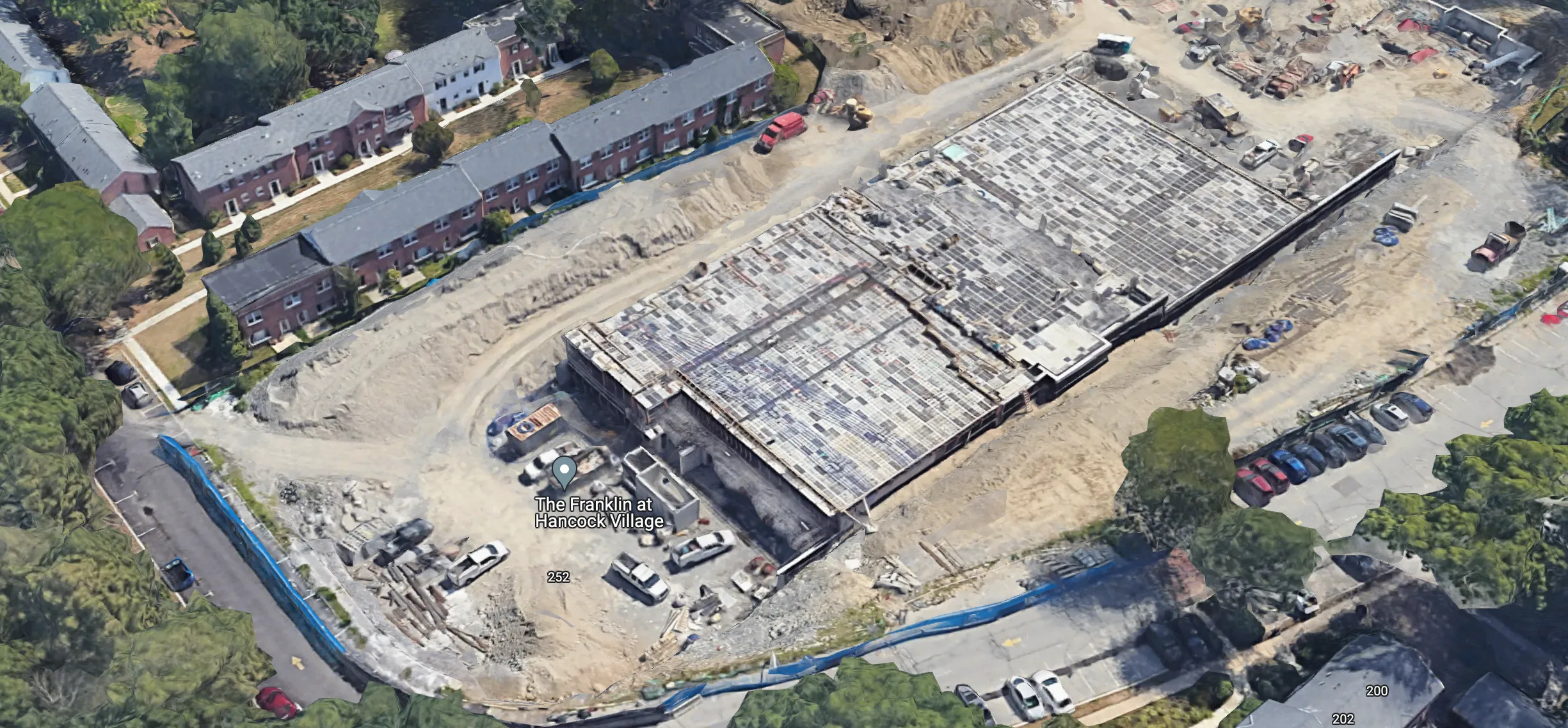 Satellite view of the apartment they built after razing the area (3x more land in the back is razed too)